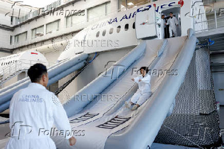 Crew members of Taiwan's China Airlines receive trainings at their center in Taoyuan