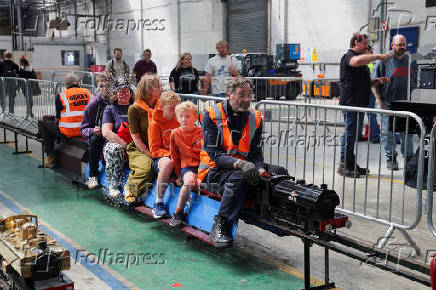Visitors ride miniature trains at The Greatest Gathering, a railway festival marking 200 years of rail history, at Alstom?s Litchurch Lane factory in Derby
