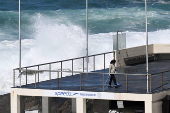 King tide swell destroys windows at Bondi Beach