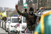 Syrian Democratic Forces (SDF) fighters convoy leaves Aleppo