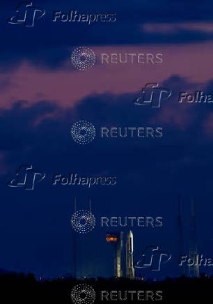 A United Launch Alliance Atlas V rocket stands on the pad with Amazon's Project Kuiper internet network satellites in Cape Canaveral