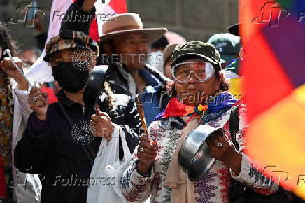 FILE PHOTO: Evo Morales supporters march in mourning amid economic crisis, in La Paz