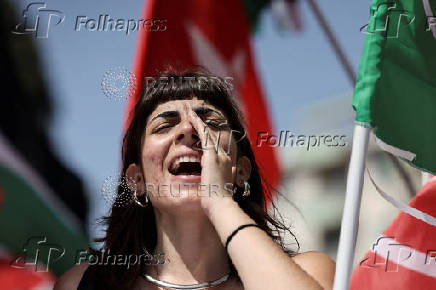 Pro-Palestinian protesters attend a demonstration calling for an end to the bombing in Gaza, in Rome