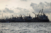 Cranes sit at an oil rig facility in Lagos