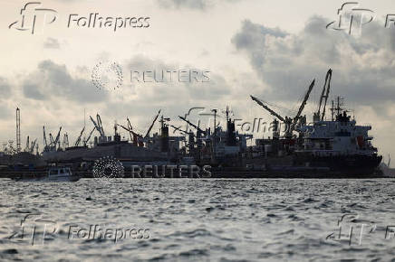 Cranes sit at an oil rig facility in Lagos