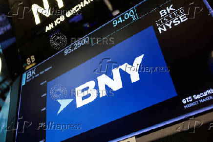 BNY Mellon investment banking company logo is displayed on a screen  on the floorat the New York Stock Exchange (NYSE) in New York City