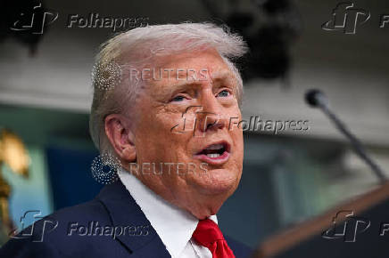 U.S. President Trump meets members of the media at the White House in Washington, D.C.