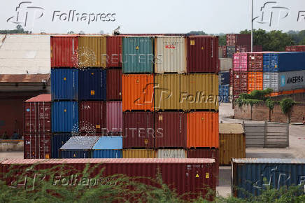 Shipping containers are parked at Thar Dry Port in Sanand