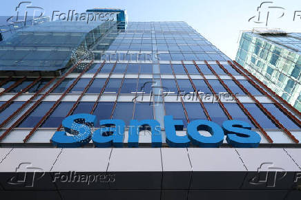A Santos logo is visible outside their headquarters in Adelaide