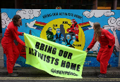 Greenpeace paints mural outside South Korea Embassy