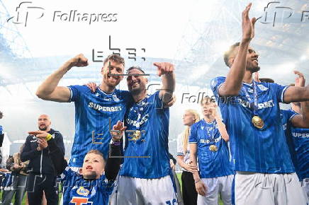 Lech Poznan team celebrate their Polish Extra League championship title