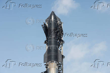 SpaceX's next-generation Starship spacecraft atop its Super Heavy booster is prepared for launch