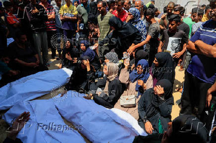 Mourners attend the funeral of Palestinians killed in what the Gaza Health Ministry said were Israeli airstrikes, in Khan Younis