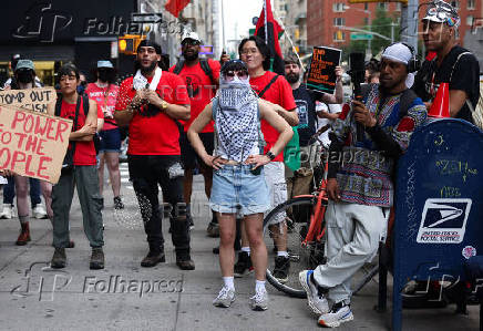People protest against federal immigration sweeps, during the Juneteenth holiday in New York