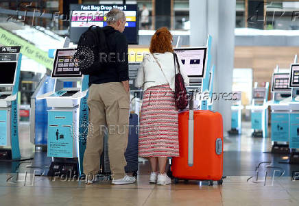 Berlin airport prepares for summer holiday travelers