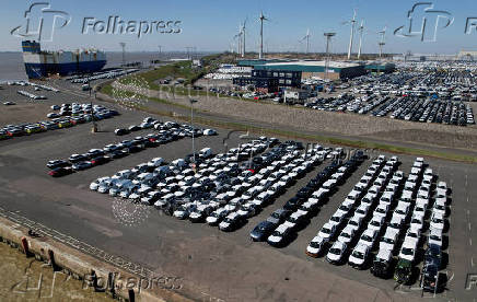 FILE PHOTO: Cars of the Volkswagen Group are waiting to be exported to the US from the seaport of Emden