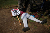 Protestors demonstrate during a May Day rally in Los Angeles