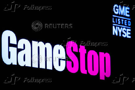 FILE PHOTO: A screen displays the logo and trading information for GameStop at the NYSE  in New York
