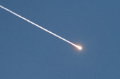 Missiles launched from Iran towards Israel are seen from Hebron