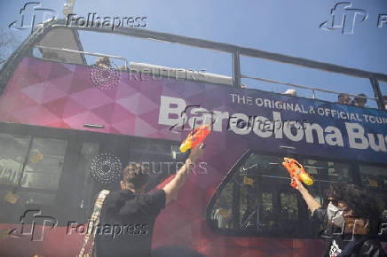 Network of cities affected by tourism in southern Europe stage protest against mass tourism at La Sagrada Familia Basilica in Barcelona