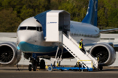 A Boeing jet intended for use by a Chinese airline returns to Boeing Field, in Seattle, Washington
