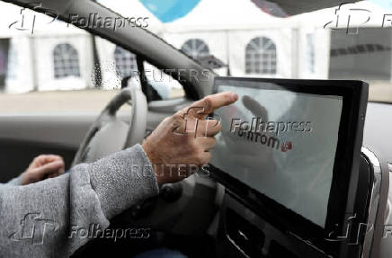 FILE PHOTO: TomTom mapping system is seen inside a vehicle in Eindhoven