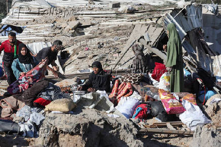 Aftermath of an Israeli strike on an UNRWA school sheltering displaced people, in the Bureij camp in the central Gaza Strip