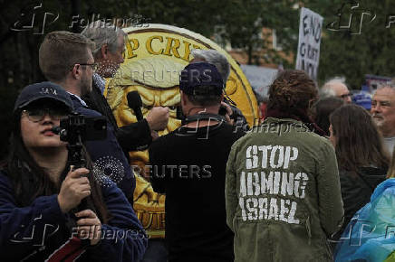Demonstrators gather outside Trump National Golf Course ahead of President Trump?s meme coin gala in Sterling
