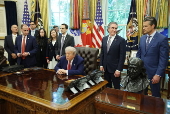 President Trump signs executive orders at the White House
