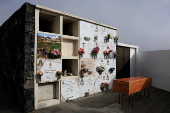 The coffin of a migrant girl, who was on a boat that capsized as it neared La Restinga harbor on the island of El Hierro, sits before its entombment in El Pinar