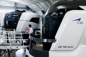 A pilot walks out of a flight simulator at Taiwan's China Airlines training center in Taoyuan
