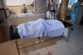 Casualties from recent clashes in Sweida receive treatment at a field medical point in Deraa