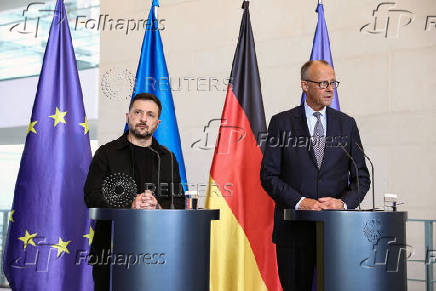 German Chancellor Merz speaks to the media, in Berlin