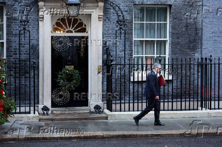 British Prime Minister Keir Starmer leaves 10 Downing Street in London