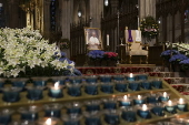 People visit St. Patrick's Cathedral to pay their respects to the late Pope Francis
