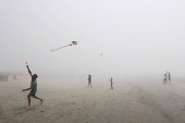 People enjoy the beach in West Wittering