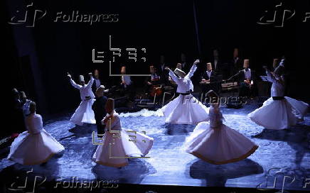 Members of Whirling Dervishes perform in Tunis