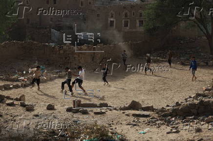 Yemeni youths play soccer in Sana'a