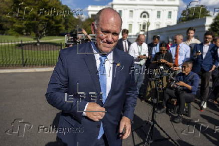 US Border Czar Tom Homan talks with news media outside the West Wing