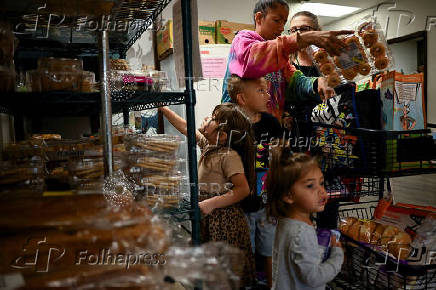Food pantry is busy, weeks into the continuing U.S. government shutdown, in Fountain
