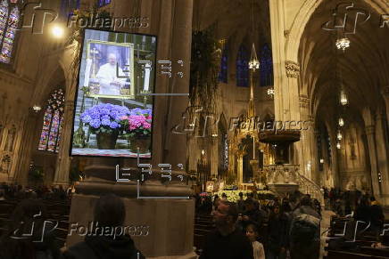 People visit St. Patrick's Cathedral to pay their respects to the late Pope Francis
