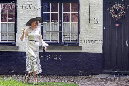 Queen Mathilde of Belgium visits the Beguinage 'Ten Wijngaerde' in Bruges