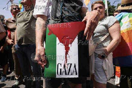 Pro-Palestinian protesters attend a demonstration calling for an end to the bombing in Gaza, in Rome