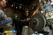 Blacksmiths sharpen blades for flagellation ahead of Ashura in Peshawar