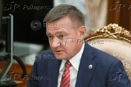 FILE PHOTO: Russian Minister of Transport Roman Starovoit attends a meeting with Russian President Vladimir Putin, in Moscow
