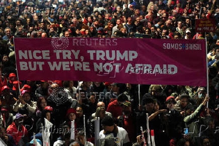 Demonstrators take part in a protest against U.S. President Donald Trump?s announcement of 50% tariffs on Brazilian products, in Sao Paulo