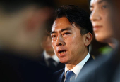 Japan's incoming Agriculture, Forestry and Fisheries Minister Shinjiro Koizumi speaks to media in Tokyo