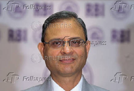 Reserve Bank of India (RBI) Governor Sanjay Malhotra arrives at a press conference in Mumbai