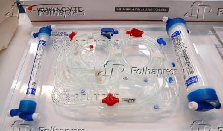 FILE PHOTO: Samples of products of Fresenius and Fresenius Medical Care are on display during the company's annual news conference at their head quarters in Bad Homburg