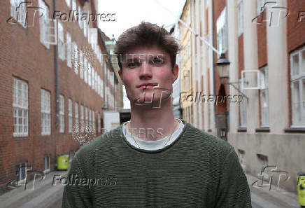 Harvard student Alfred Williamson, who comes from Wales, stands in a street in Copenhagen
